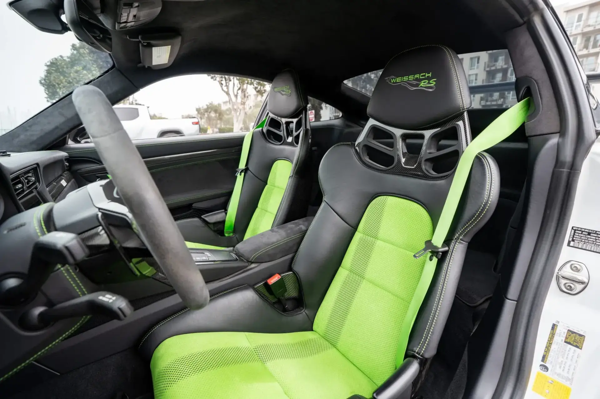 2019 Porsche 911 GT3 RS Weissach interior with carbon-fiber bucket seats and Lizard Green Alcantara accents