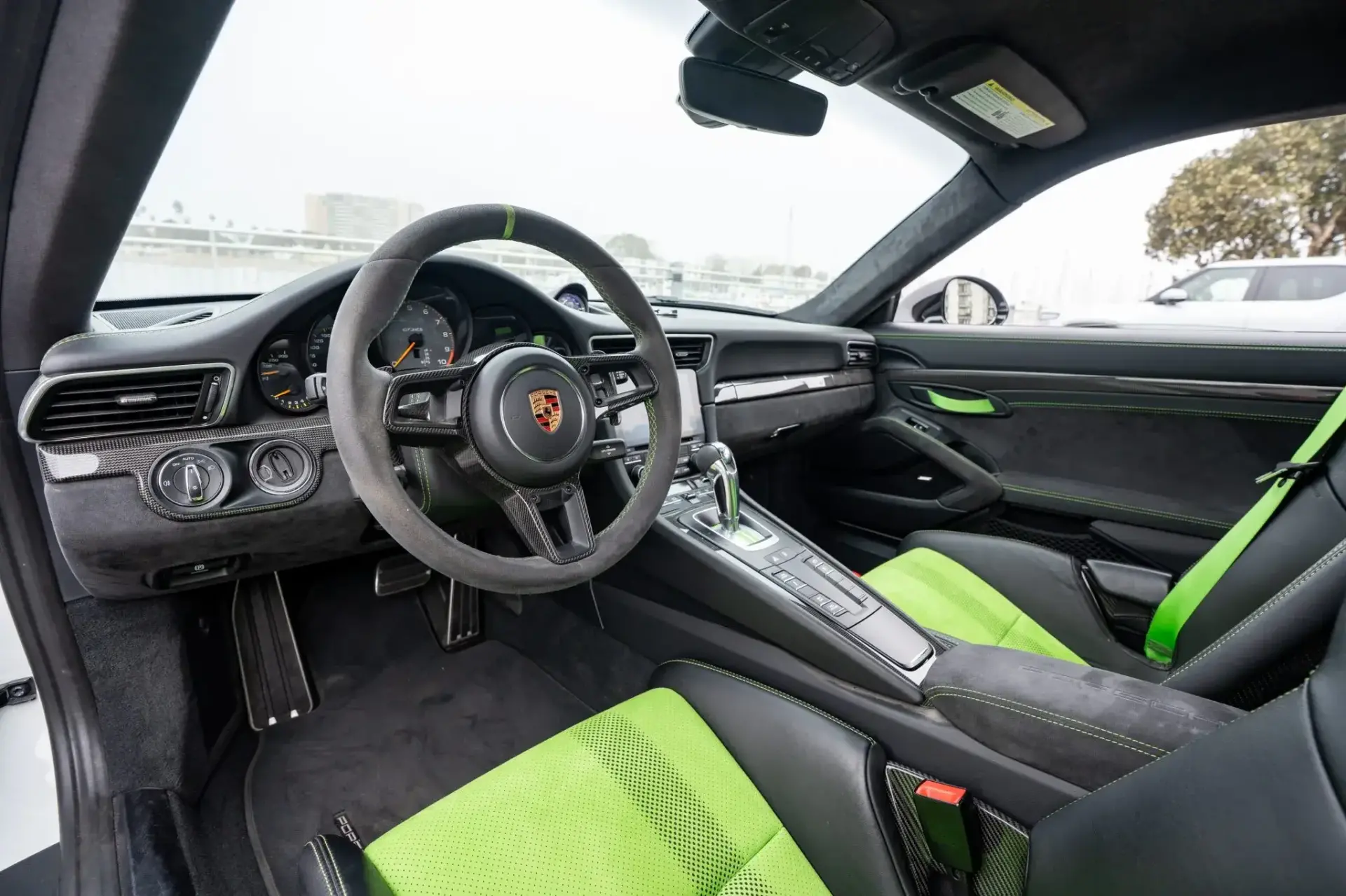 2019 Porsche 911 GT3 RS Weissach cockpit showing carbon-fiber trim and motorsport-grade instrumentation