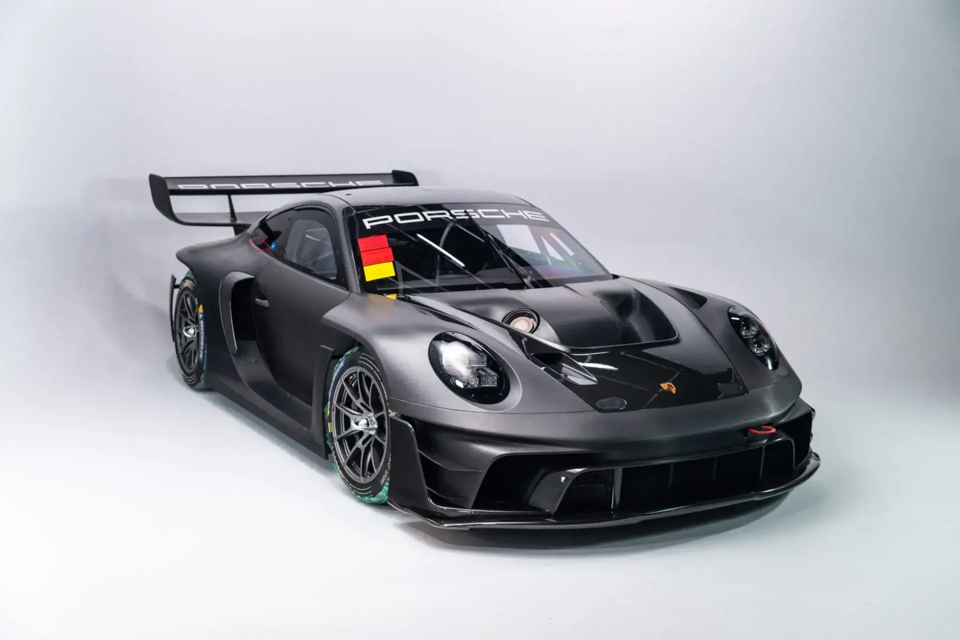 2024 Porsche 911 GT3 R Rennsport carbon fiber bodywork and aerodynamic design at auction