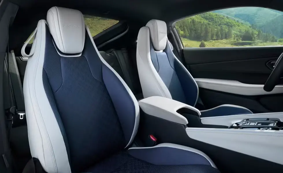 2026 Honda Prelude interior showing leather-trimmed heated seats with houndstooth pattern and premium materials