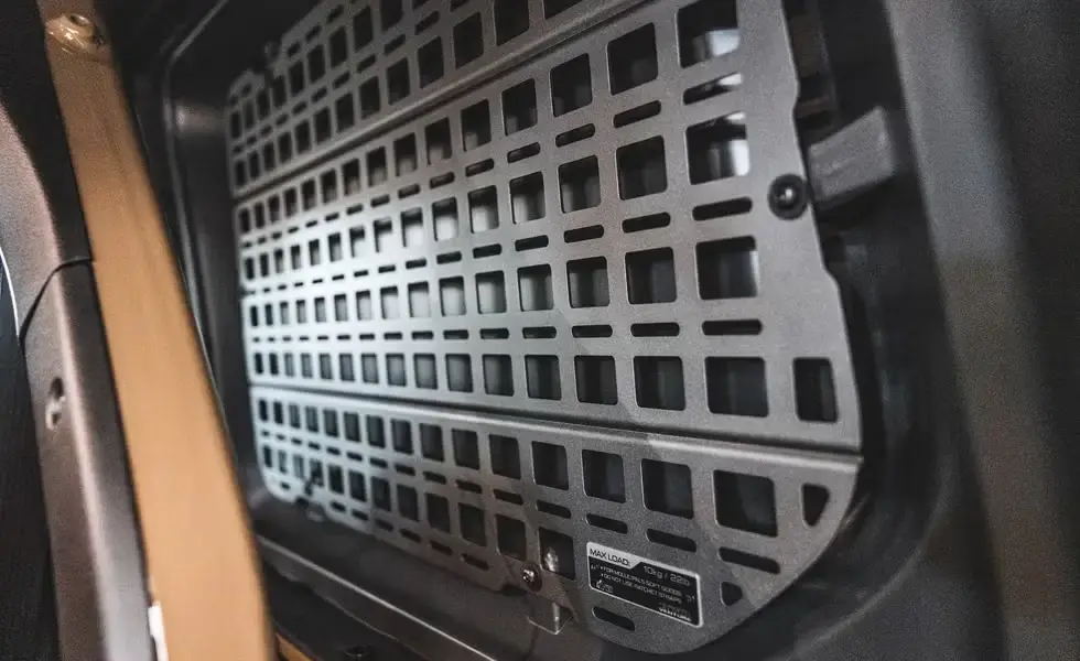 Interior view of AEV Jeep Wrangler Venture Pack showing painted hardtop liner and branded headrests with 370 Venture logo embroidery