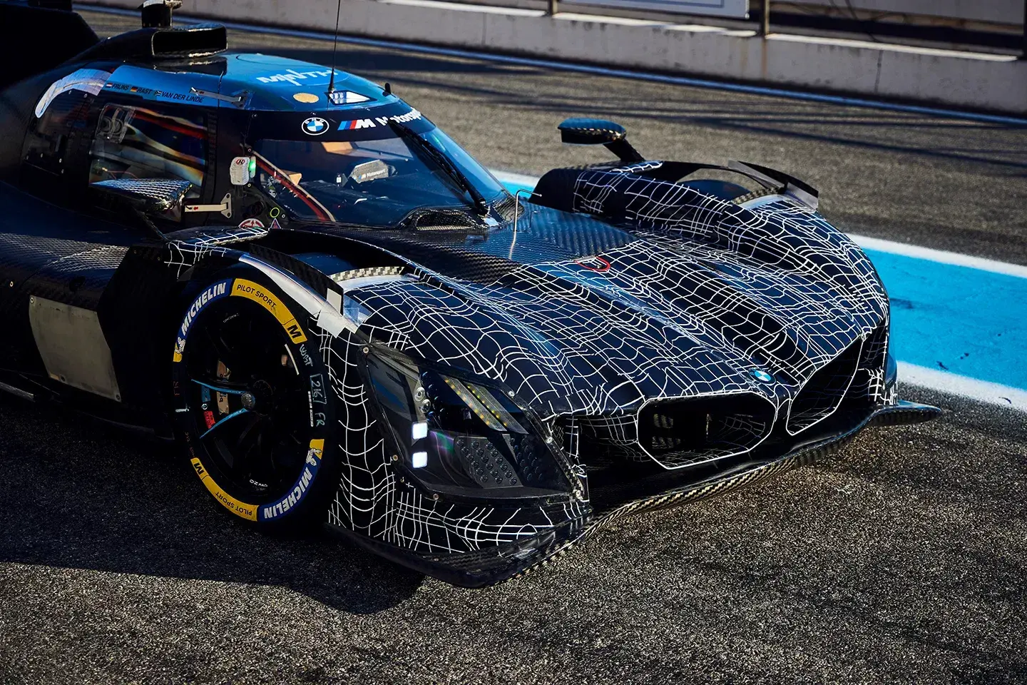 Side profile of BMW M Hybrid V8 2026 showing aerodynamic elements and hybrid powertrain configuration