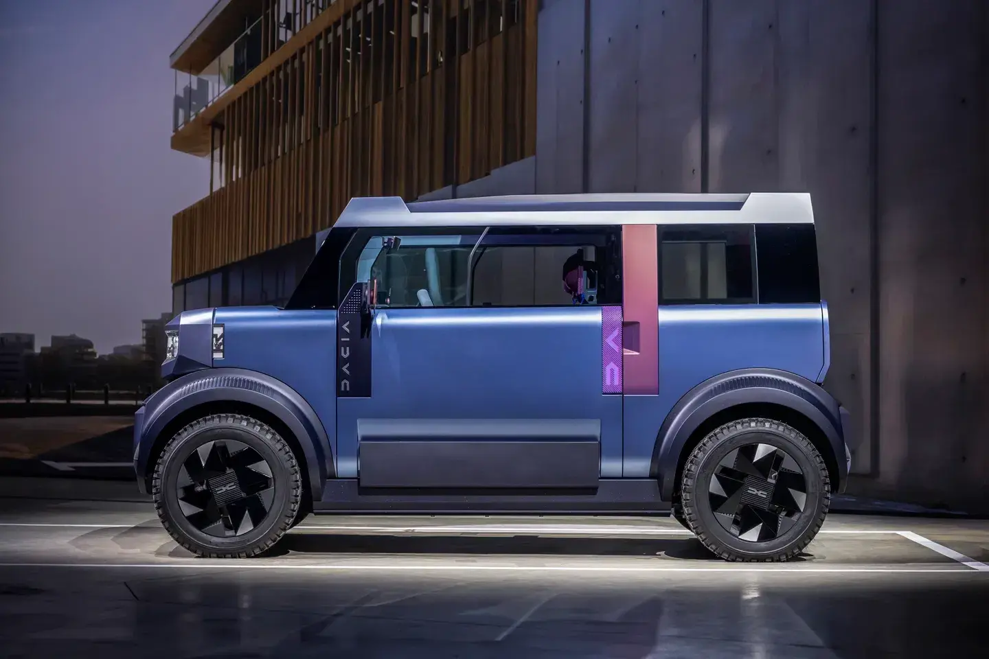 Dacia Hipster interior showing innovative recyclable fabric seats, smartphone integration, and space-efficient cabin design for four adults