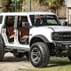 Ford Bronco pickup truck with six wheels