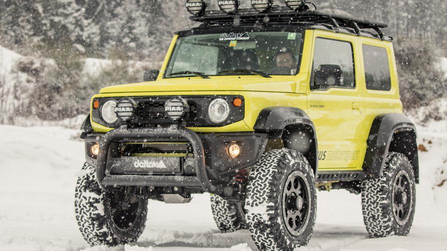 Delta4x4 suzuki jimny yellow snow side