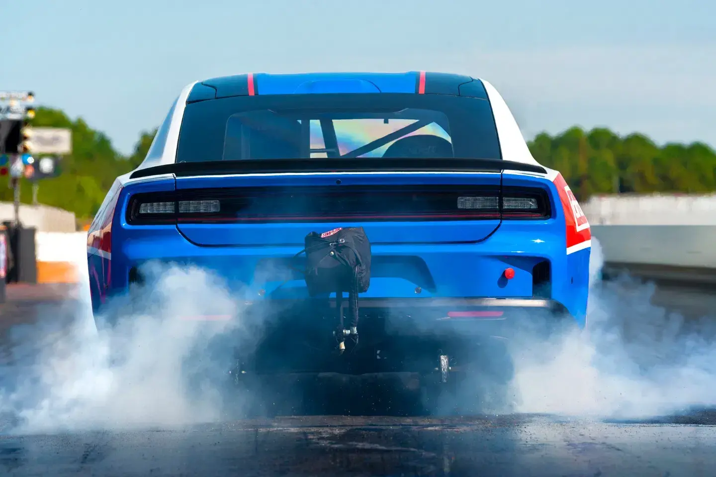 Dodge Charger Drag Pak NHRA certified drag racing machine with parachute system