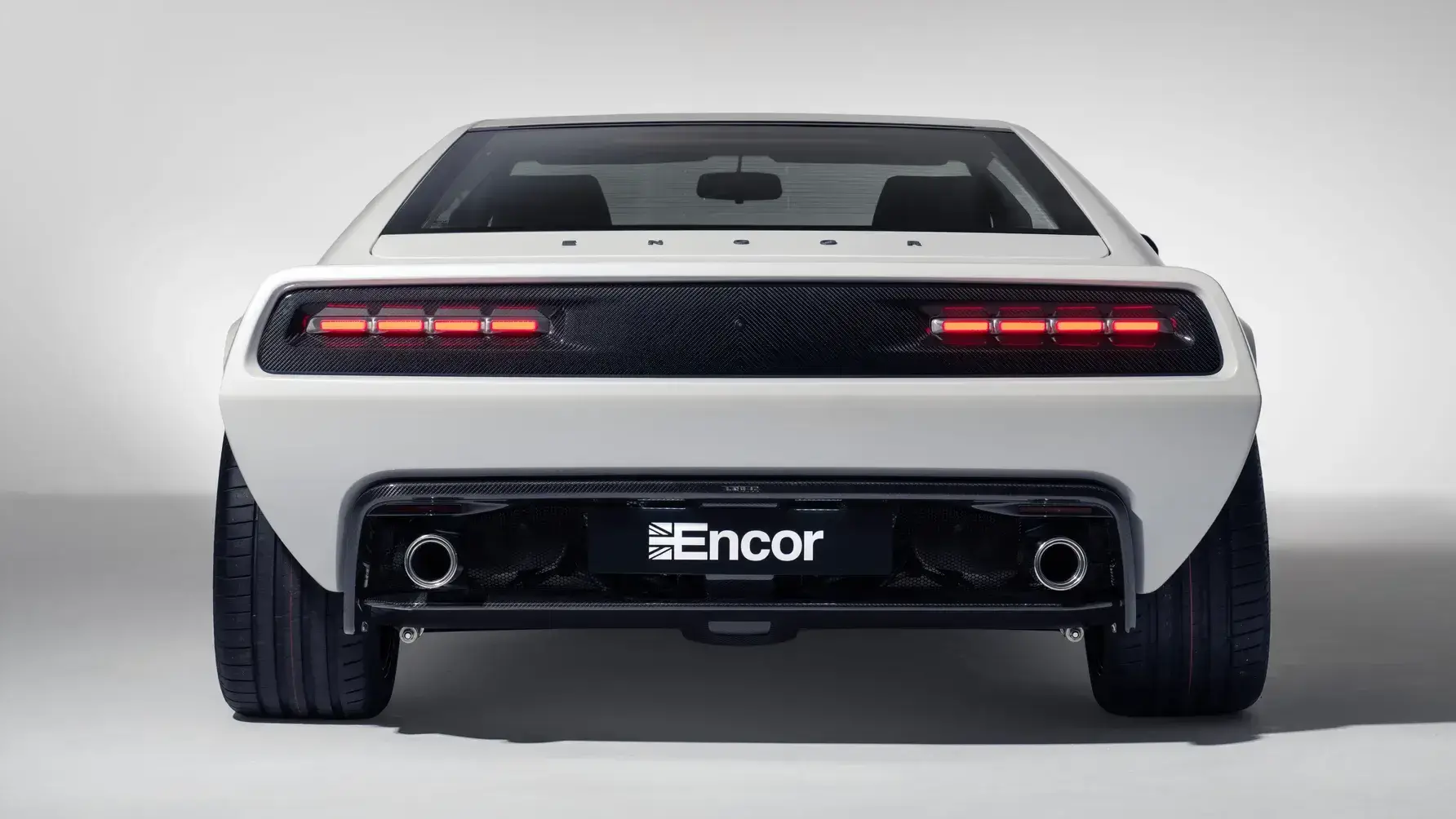 Encor Series 1 Lotus Esprit V8 rear three-quarter view displaying carbon fiber body and modernized LED taillights