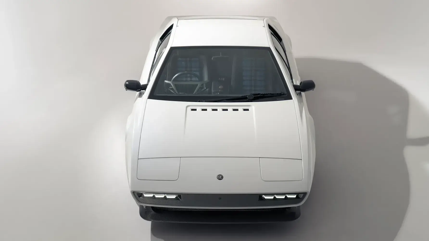 Encor Series 1 Lotus Esprit V8 showcasing complete carbon fiber restomod transformation with original wedge silhouette