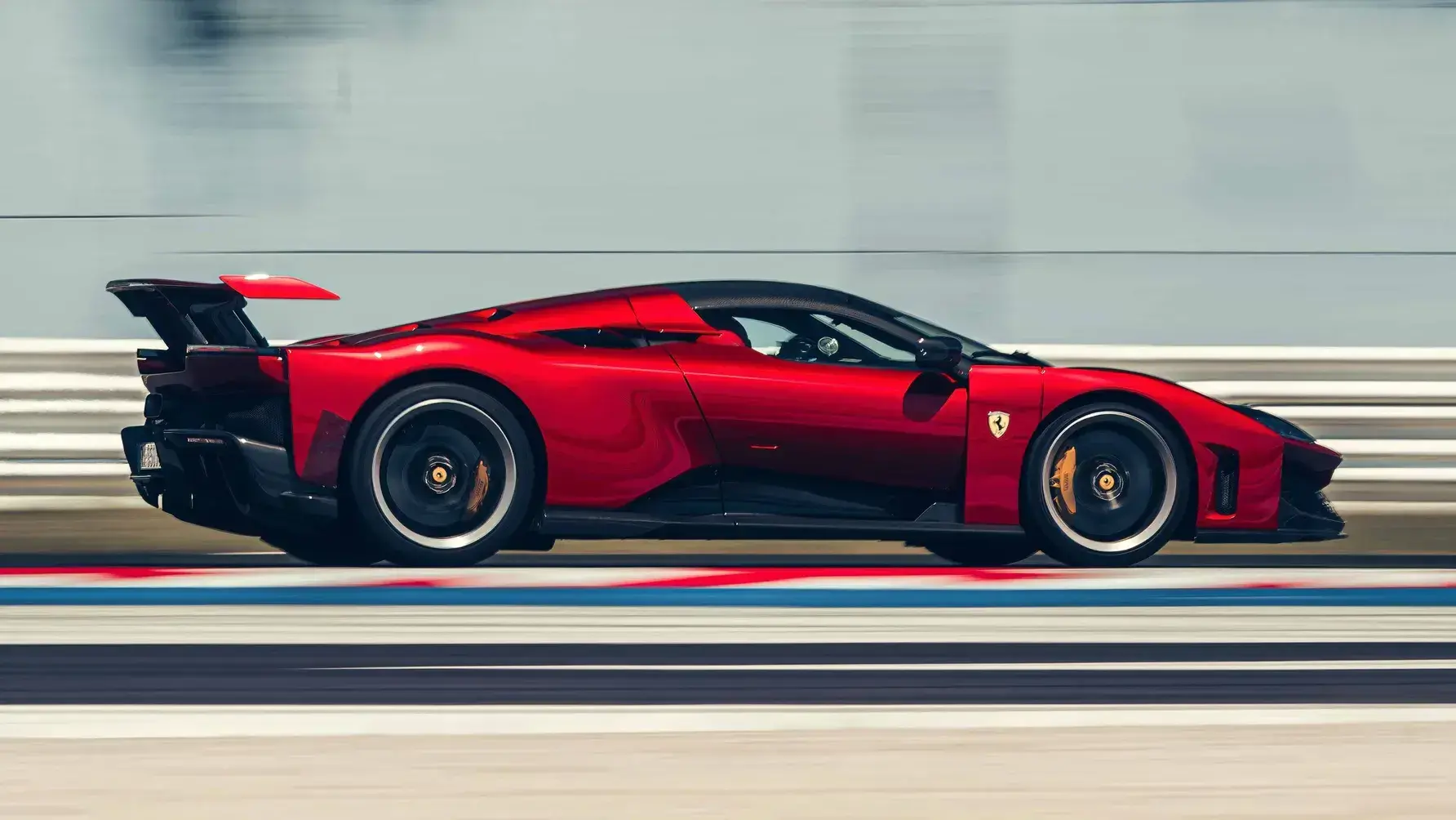 Ferrari F80 side profile highlighting the carbon fiber chassis, advanced suspension components, and aerodynamic elements