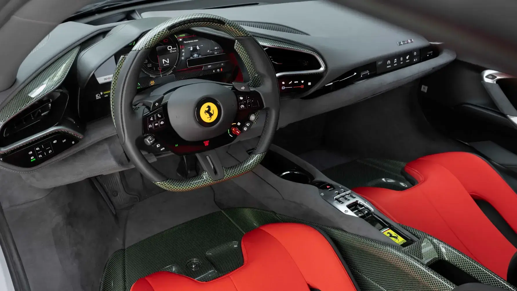 Ferrari SC40 interior featuring Kevlar materials, Alcantara upholstery, carbon fiber accents, and purposeful driver-focused design