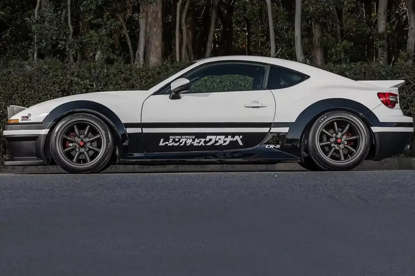 Toyota GT86 Neo86 bodykit side profile showing widened fender flares and lowered stance with flush wheels
