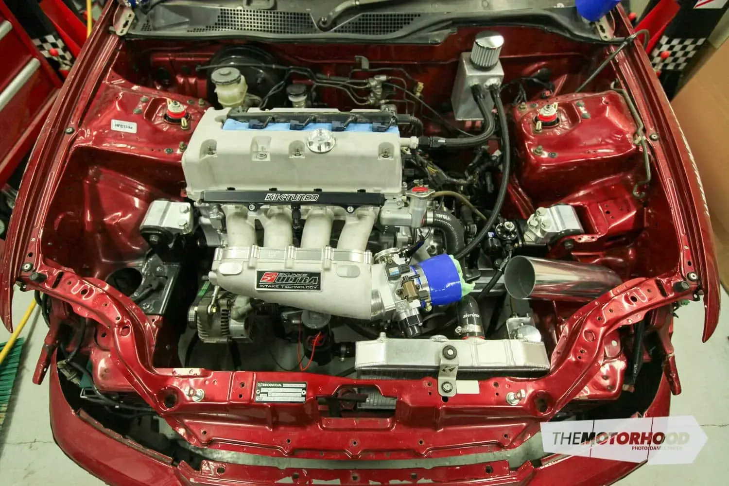 Modified Honda Civic with K-series engine swap in clean engine bay