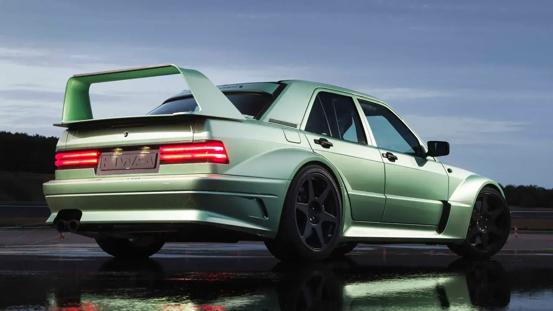 HWA Evo II Restomod Rear View with DTM-Style Aerodynamics HWA Mercedes 190E Evo II restomod rear view highlighting motorsport heritage and modern performance engineering
