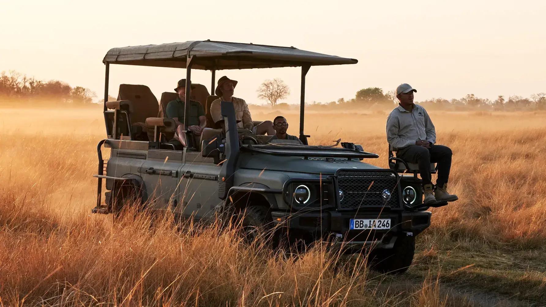 Ineos Grenadier Game Viewer rear three-quarter view showing tiered seating configuration and raised safari platform