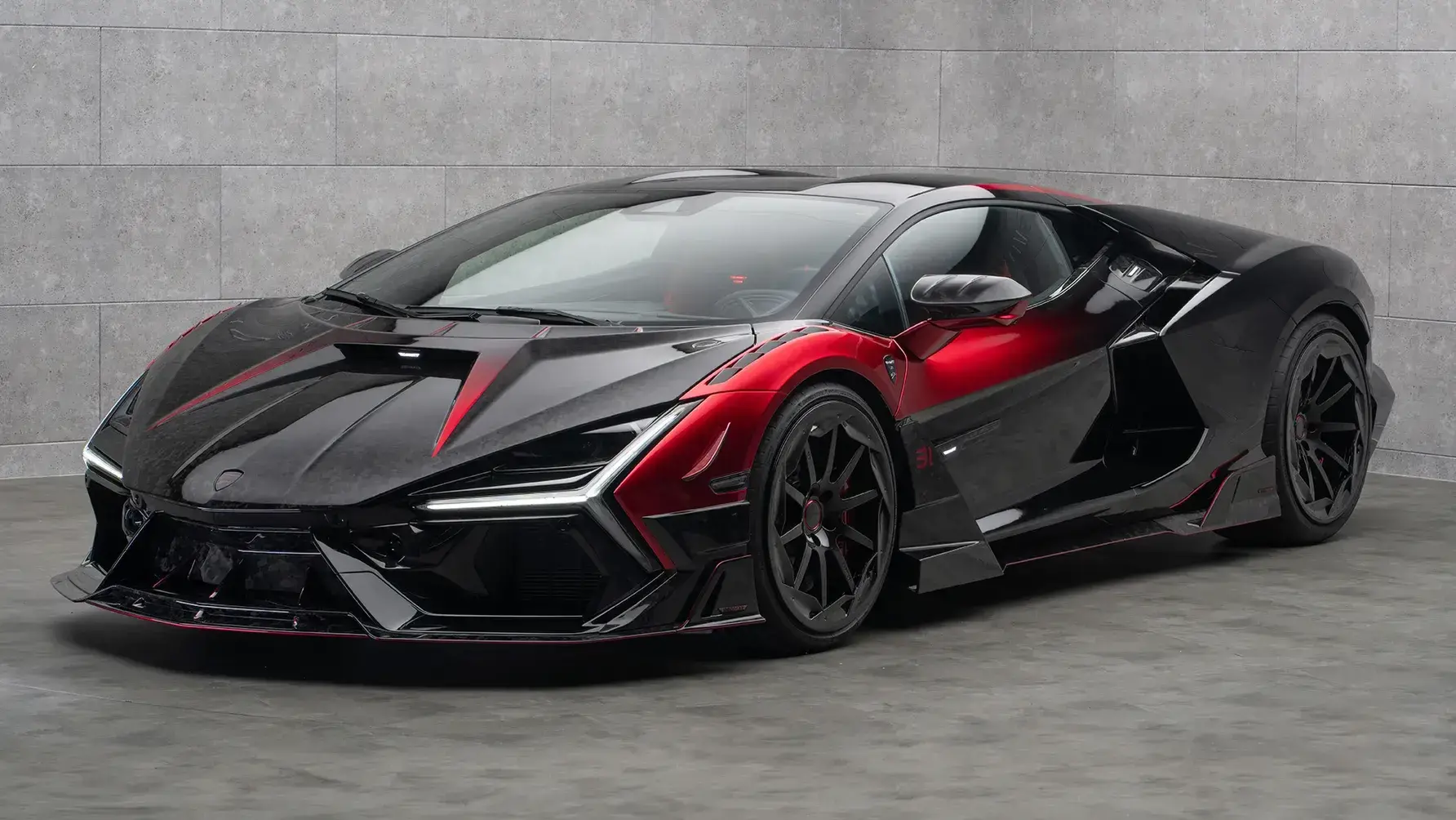 Mansory Lamborghini Revuelto owned by F1 driver Esteban Ocon featuring marbled carbon fiber bodywork and custom aerodynamics