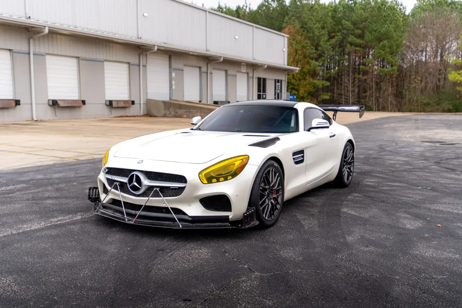 2016 Mercedes-AMG GT S track car in Designo Diamond White with APR carbon fiber front splitter and yellow-tinted headlights