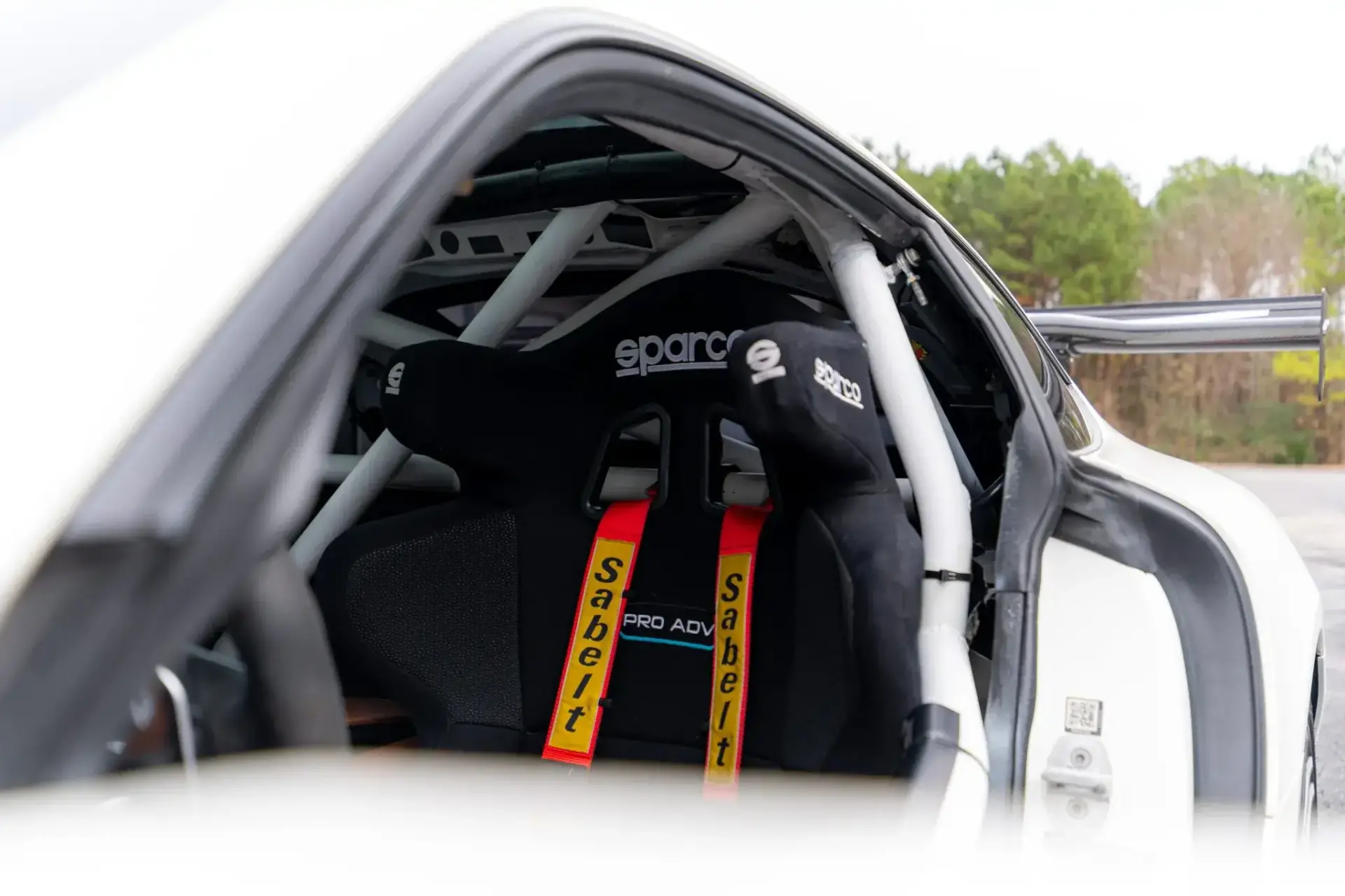 2016 Mercedes-AMG GT S stripped racing interior with roll cage door bars Sparco seats and AiM MXT digital cluster