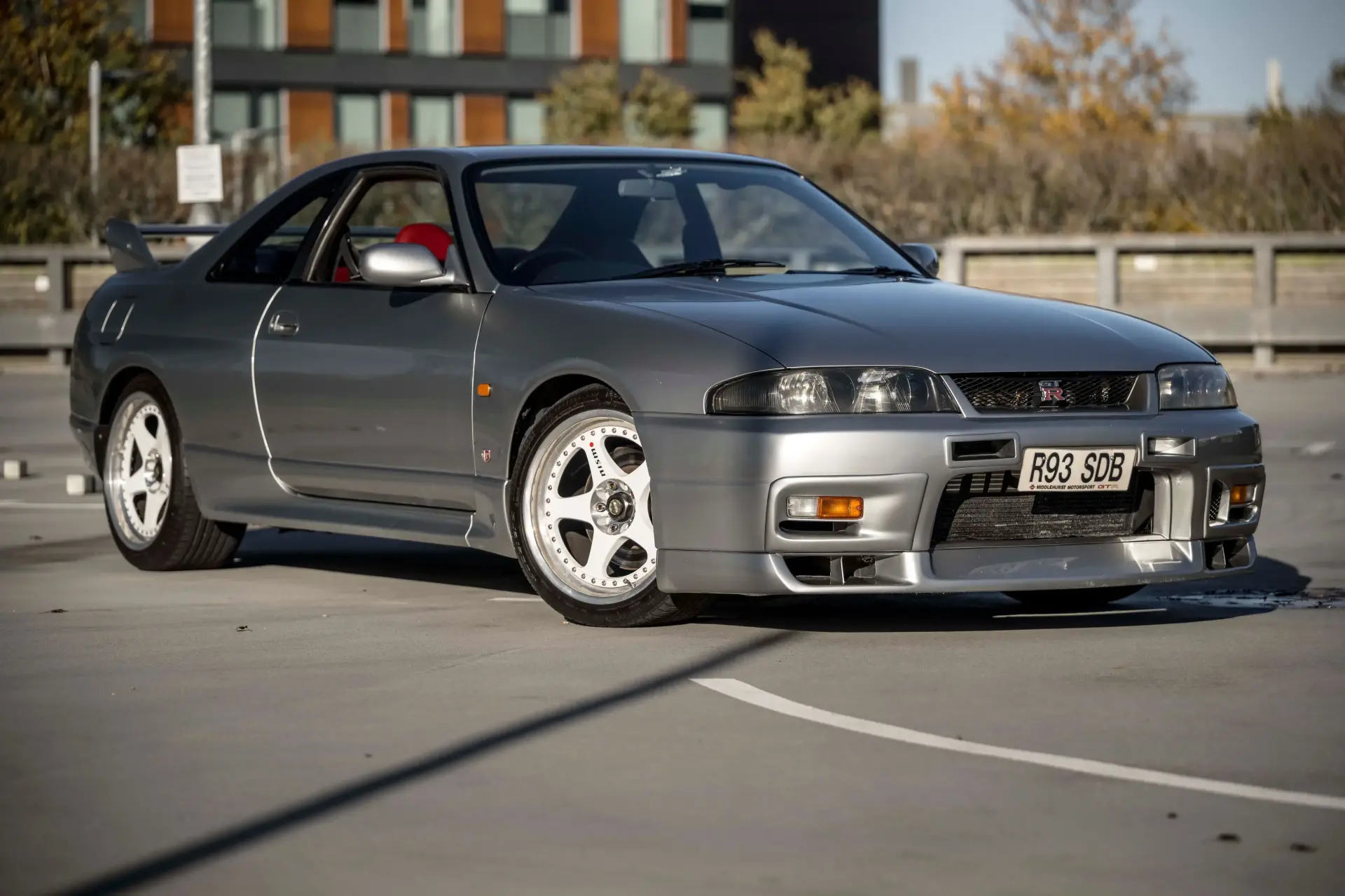 Nissan R33 GT-R V-Spec 1998 front three-quarter view with rare red leather interior UK model