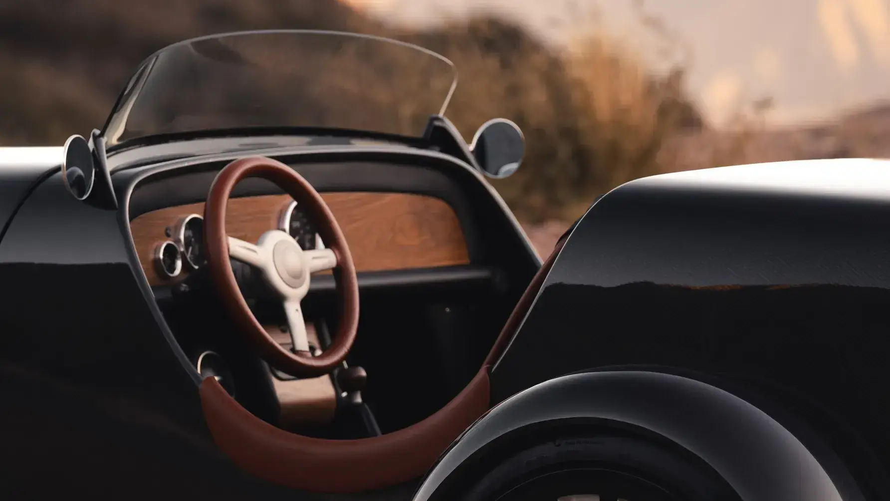 SP40 Restomod Speedster side profile highlighting flowing fenders, tapered tail, and low-slung roadster proportions