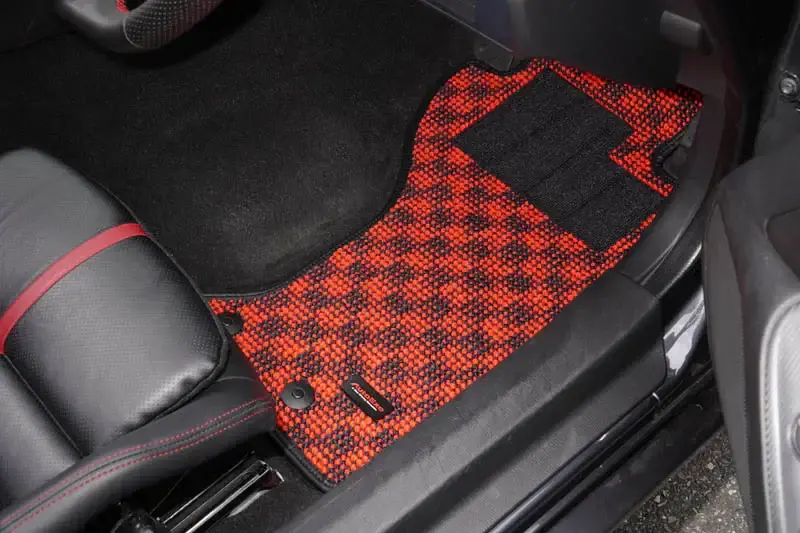 Custom fitted all-weather floor mats in car interior