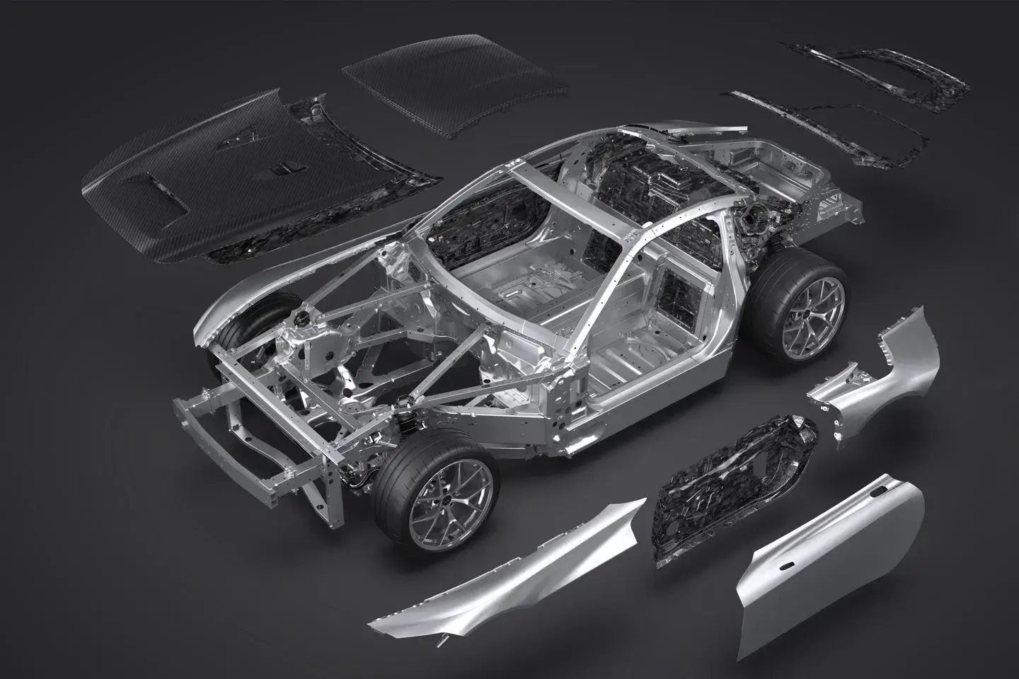 Toyota GR GT side profile displaying carbon fiber body panels, 20-inch wheels with Michelin Pilot Sport Cup 2 tires, and racing-inspired vents