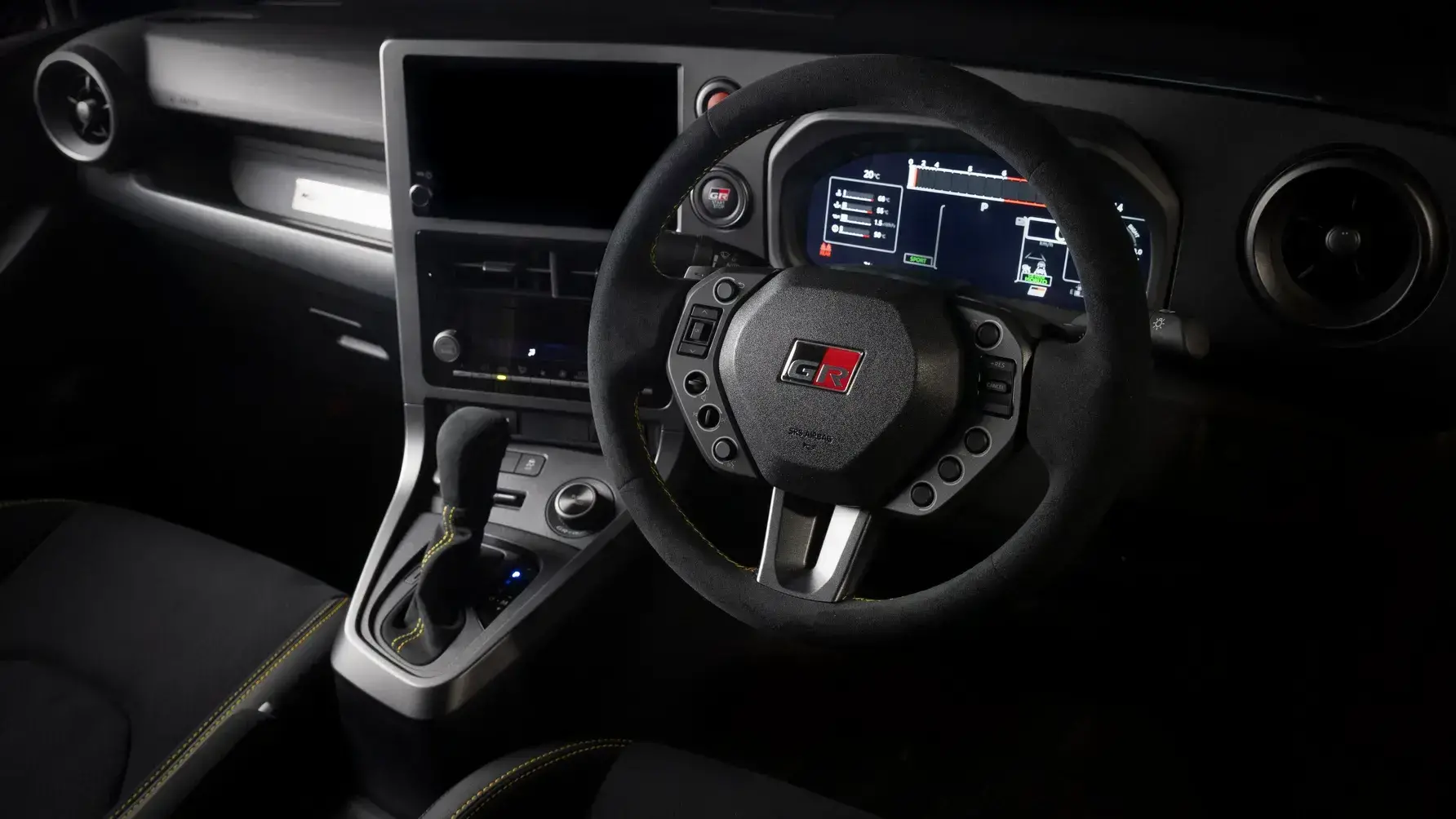 2026 Toyota GR Yaris Morizo RR interior featuring suede trim, TFT display, and numbered exclusivity plaque