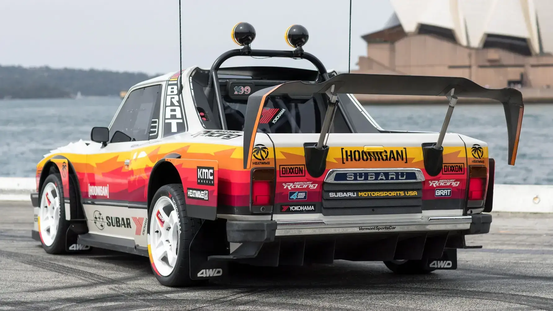 Travis Pastrana Subaru Brataroo widebody rear view showing kangaroo livery retro rally design and custom carbon fiber bodywork