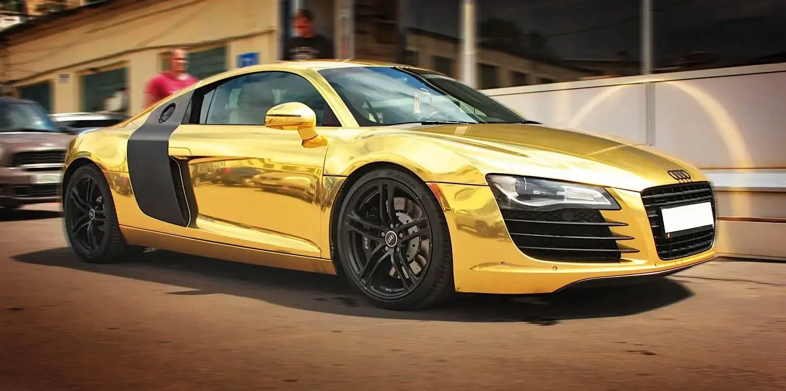 Car wrapped in custom vinyl finish with racing stripes